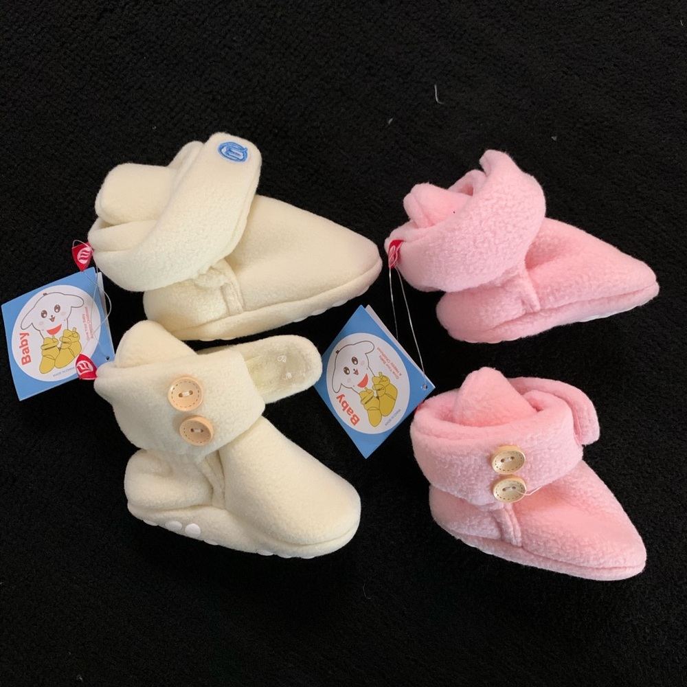 2 pairs of new born booties